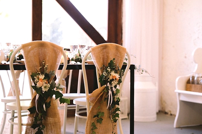 Relaxed-Vintage-Boho-Wedding-Inspiration-Reception-Chair-Back-Flowers